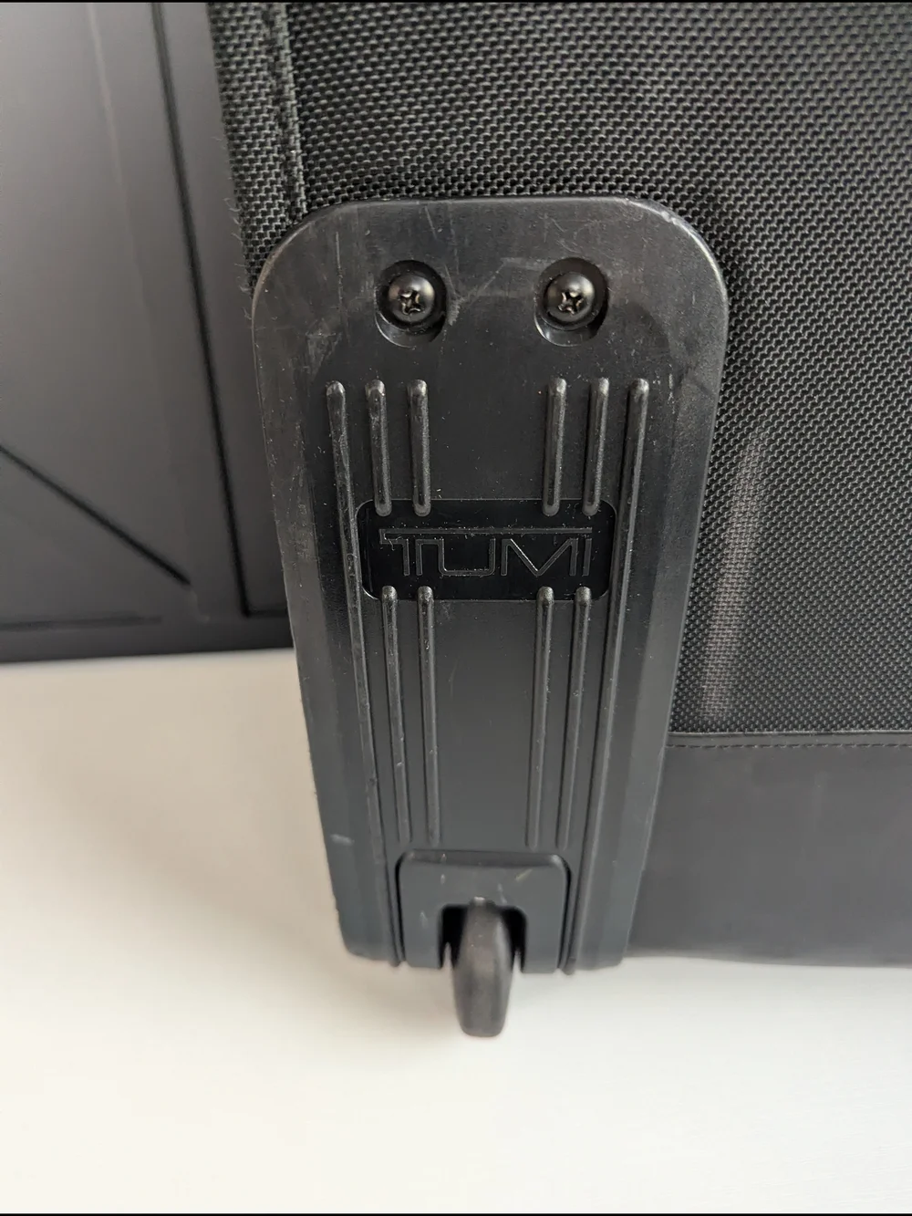 Tumi Black Men’s Carry-On Rolling Travel Bag